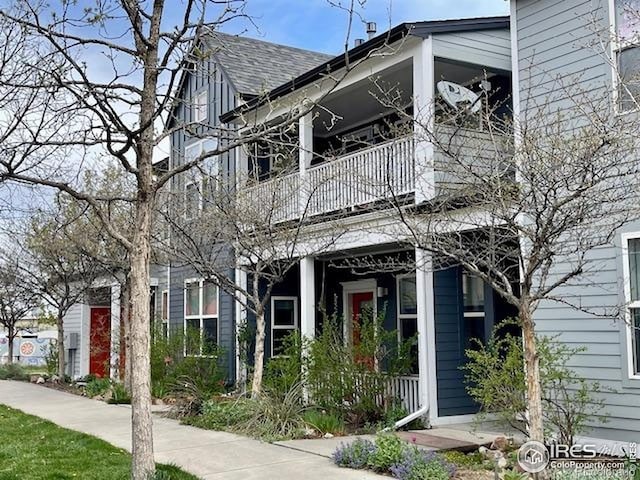 1400 Lee Hill Dr Unit 1, Boulder, CO 80304 - view of front of house with a balcony and roof with shingles
