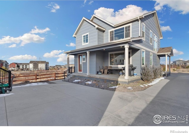 1958 Autumn Moon Dr, Windsor, CO 80550 - view of front of house with covered porch