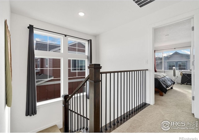 1958 Autumn Moon Dr, Windsor, CO 80550 - hall with an upstairs landing, carpet floors, and recessed lighting