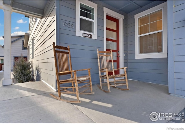 1958 Autumn Moon Dr, Windsor, CO 80550 - property entrance with a porch
