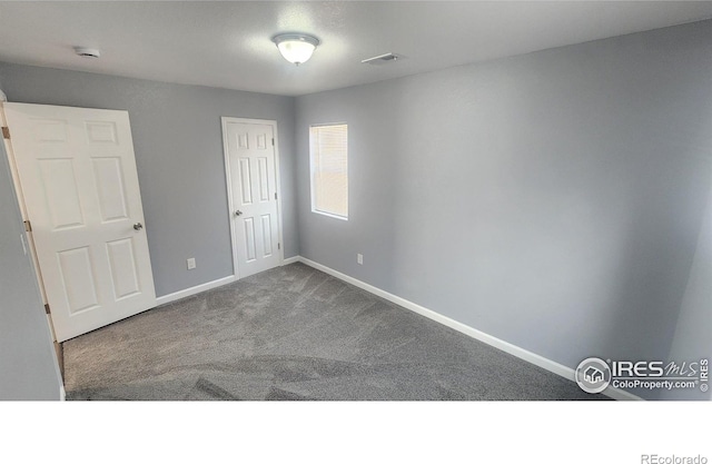222 Platte St, Sterling, CO 80751 - unfurnished bedroom featuring carpet flooring, baseboards, and a closet