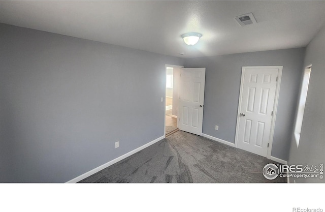 222 Platte St, Sterling, CO 80751 - unfurnished bedroom with baseboards and carpet