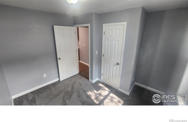 222 Platte St, Sterling, CO 80751 - unfurnished bedroom featuring carpet flooring and baseboards