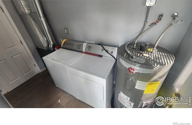 222 Platte St, Sterling, CO 80751 - laundry area with washing machine and clothes dryer and dark wood-type flooring