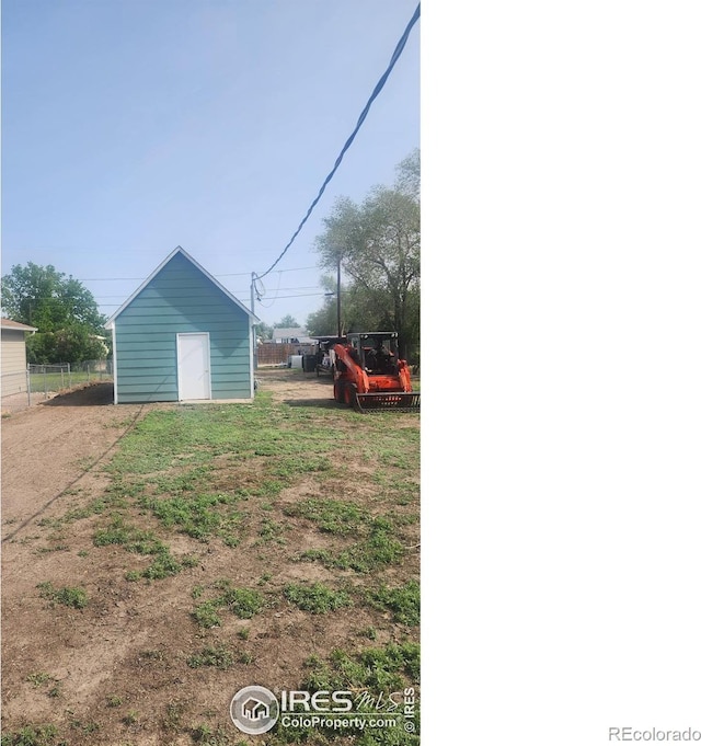 222 Platte St, Sterling, CO 80751 - view of yard with an outdoor structure