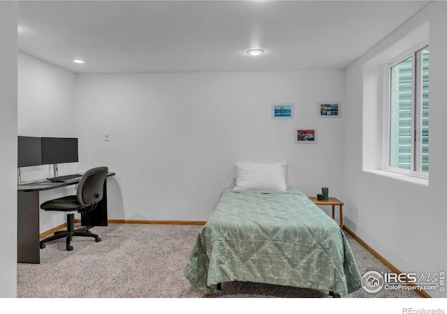 1309 Red Mountain Dr, Longmont, CO 80504 - carpeted bedroom featuring a desk and recessed lighting