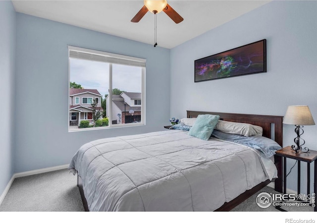 1309 Red Mountain Dr, Longmont, CO 80504 - bedroom with carpet floors and a ceiling fan