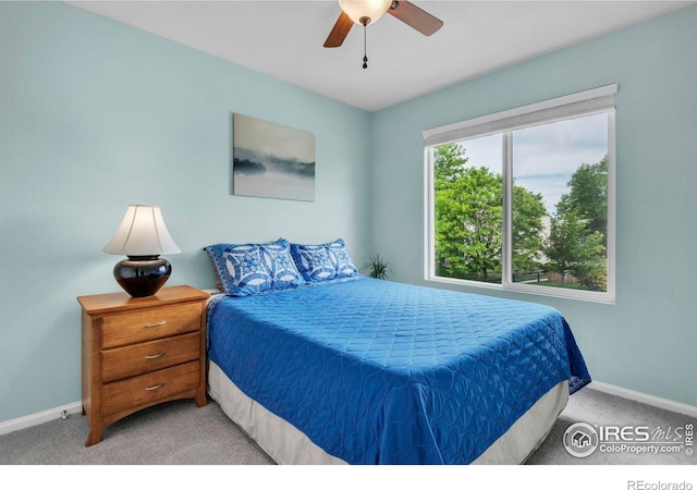 1309 Red Mountain Dr, Longmont, CO 80504 - bedroom with carpet and a ceiling fan