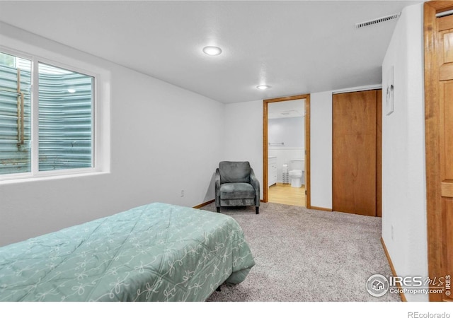 1309 Red Mountain Dr, Longmont, CO 80504 - bedroom with carpet floors, connected bathroom, and recessed lighting