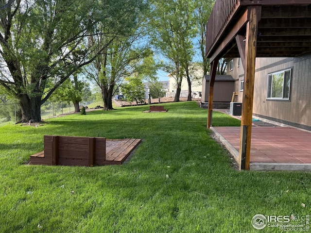 507 Ellis Ave, Wray, CO 80758 - view of yard featuring central AC and a patio area