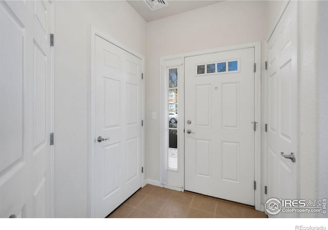 2202 Owens Ave # 102, Fort Collins, CO 80528 - entrance foyer with light tile patterned floors