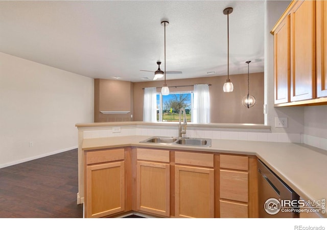 2202 Owens Ave # 102, Fort Collins, CO 80528 - kitchen with a sink, a peninsula, dishwasher, light brown cabinets, and dark wood-type flooring