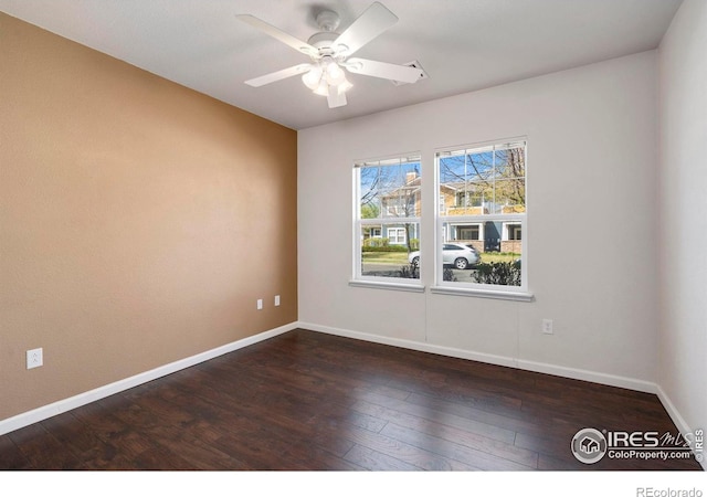 2202 Owens Ave # 102, Fort Collins, CO 80528 - unfurnished room featuring dark wood-type flooring, baseboards, and ceiling fan