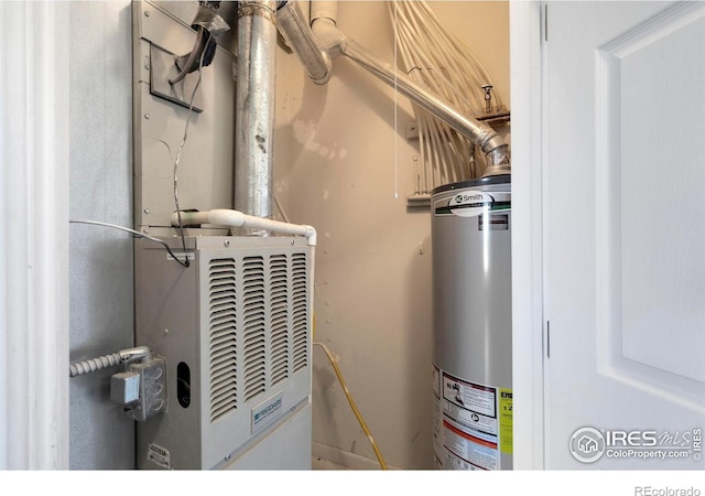 2202 Owens Ave # 102, Fort Collins, CO 80528 - utility room featuring gas water heater