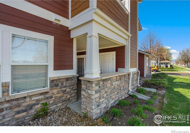 2202 Owens Ave # 102, Fort Collins, CO 80528 - entrance to property featuring stone siding