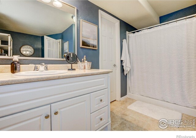 6208 Treestead Ct, Fort Collins, CO 80528 - bathroom with vanity, tile patterned floors, and curtained shower