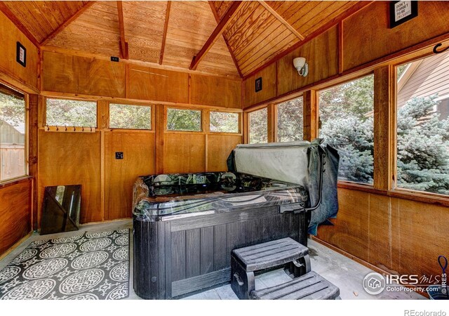6208 Treestead Ct, Fort Collins, CO 80528 - sunroom with a jacuzzi and healthy amount of natural light