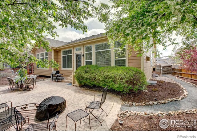 6208 Treestead Ct, Fort Collins, CO 80528 - view of patio featuring a gate