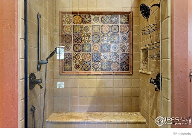 409 Wild Horse Cir, Boulder, CO 80304 - bathroom with tiled shower and a textured wall