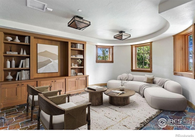 409 Wild Horse Cir, Boulder, CO 80304 - living area featuring stone tile floors and baseboards