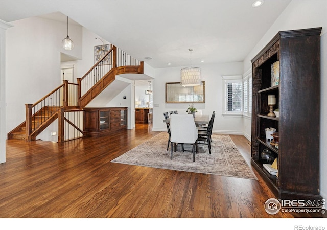 3835 Norwood Ct, Boulder, CO 80304 - dining room featuring wood finished floors, stairs, recessed lighting, and baseboards