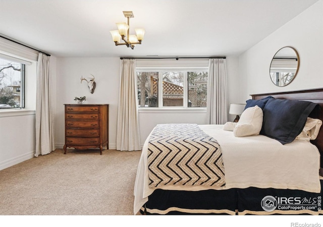 3835 Norwood Ct, Boulder, CO 80304 - carpeted bedroom featuring a chandelier and baseboards