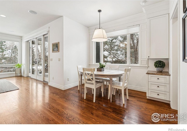 3835 Norwood Ct, Boulder, CO 80304 - dining space with baseboards, dark wood-type flooring, and french doors