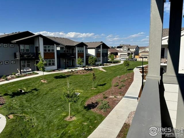 539 Vicot Way Unit C, Fort Collins, CO 80524 - surrounding community featuring a residential view and a yard