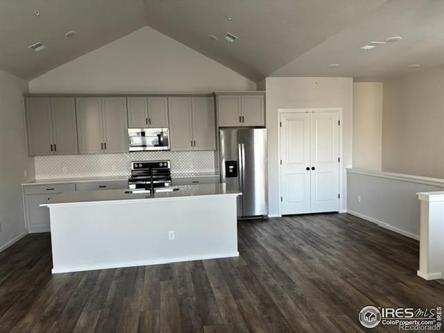 539 Vicot Way Unit C, Fort Collins, CO 80524 - kitchen featuring stainless steel appliances, gray cabinetry, a sink, an island with sink, and light countertops