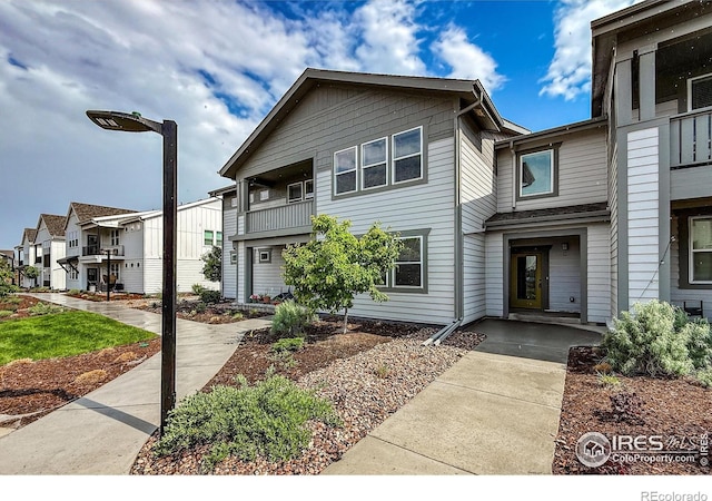539 Vicot Way Unit C, Fort Collins, CO 80524 - townhome / multi-family property featuring a balcony