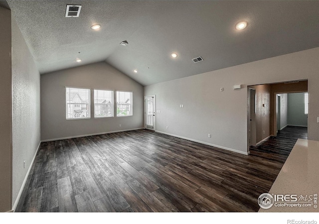 539 Vicot Way Unit C, Fort Collins, CO 80524 - unfurnished room featuring dark wood finished floors, lofted ceiling, and recessed lighting