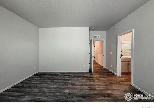 539 Vicot Way Unit C, Fort Collins, CO 80524 - empty room featuring dark wood-style floors and baseboards