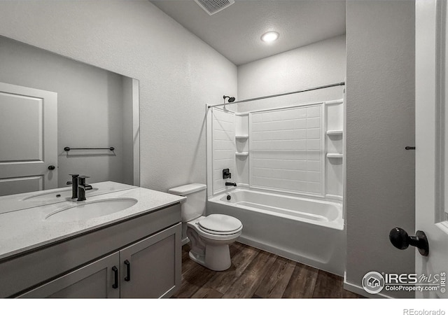 539 Vicot Way Unit C, Fort Collins, CO 80524 - bathroom featuring wood finished floors, vanity, shower / washtub combination, and a textured wall
