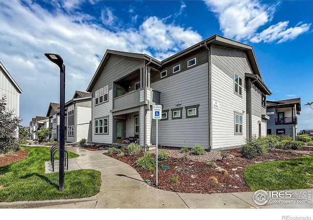 539 Vicot Way Unit C, Fort Collins, CO 80524 - view of front facade with a balcony and a residential view