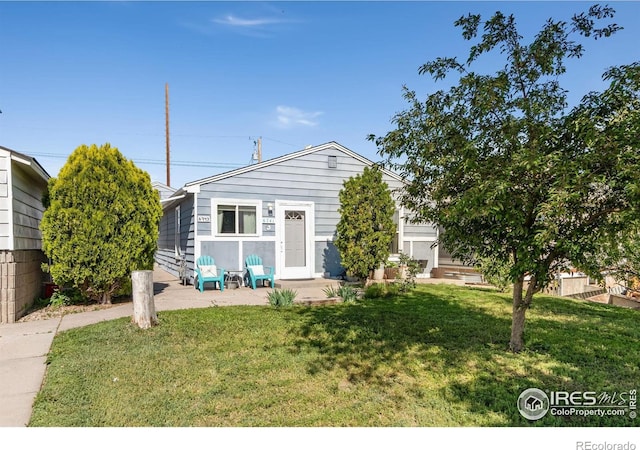 6743 King St, Denver, CO 80221 - view of front of property featuring a front yard