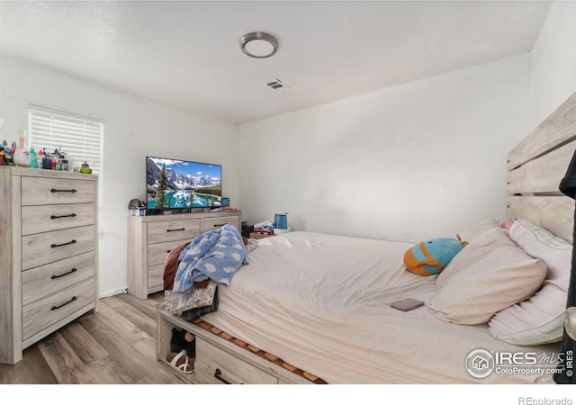 6743 King St, Denver, CO 80221 - bedroom featuring wood finished floors