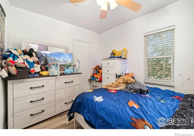 6743 King St, Denver, CO 80221 - bedroom with wood finished floors and ceiling fan