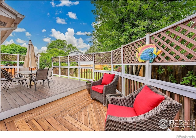 13112 Summit Grove Pkwy, Thornton, CO 80241 - wooden terrace featuring outdoor dining space
