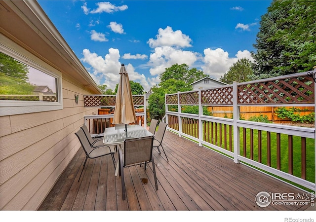 13112 Summit Grove Pkwy, Thornton, CO 80241 - wooden deck featuring outdoor dining area