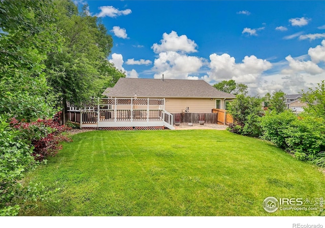 13112 Summit Grove Pkwy, Thornton, CO 80241 - rear view of house featuring a wooden deck