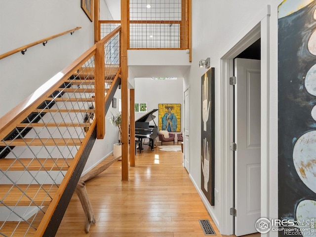 404 W Cleveland St, Lafayette, CO 80026 - entrance foyer featuring light wood finished floors, a high ceiling, and baseboards