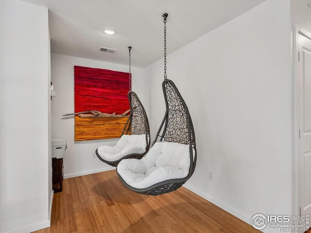 404 W Cleveland St, Lafayette, CO 80026 - sitting room with baseboards and wood finished floors