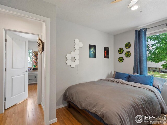404 W Cleveland St, Lafayette, CO 80026 - bedroom featuring light wood finished floors, baseboards, and ceiling fan