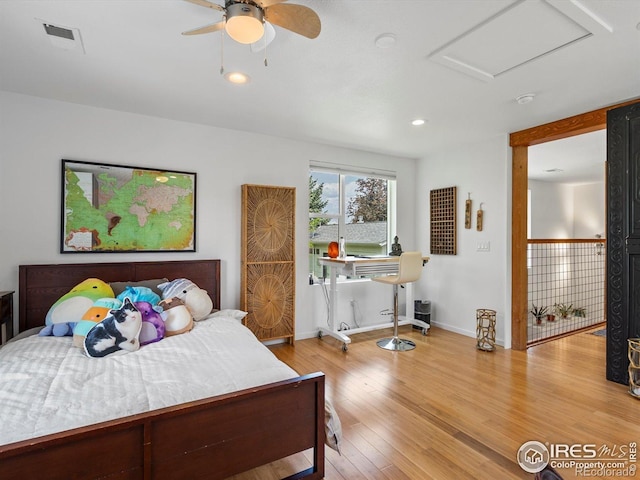 404 W Cleveland St, Lafayette, CO 80026 - bedroom featuring wood finished floors, attic access, baseboards, recessed lighting, and ceiling fan