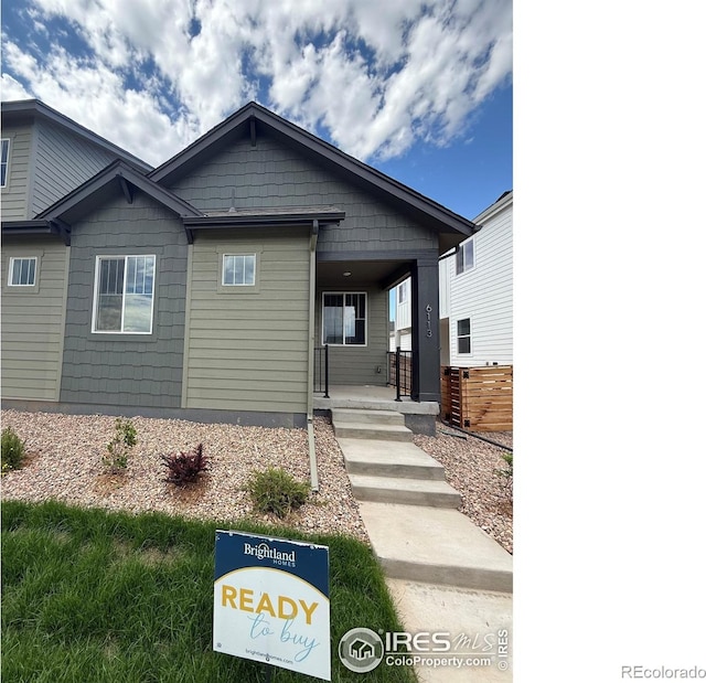 6113 Zebulon Pl, Timnath, CO 80547 - view of front of property featuring covered porch