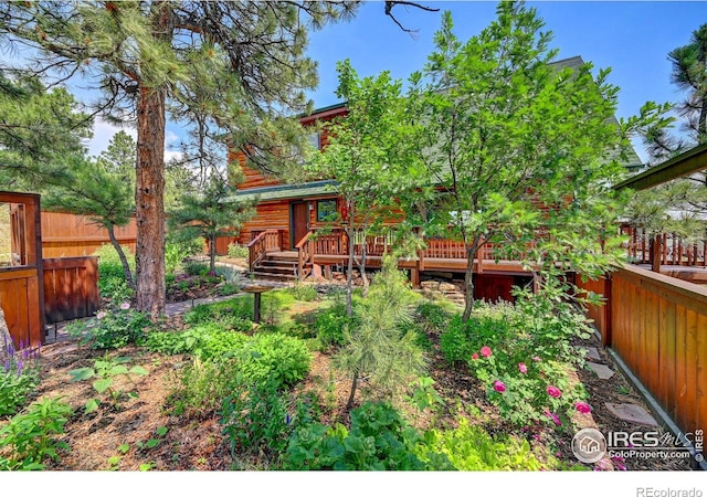 114 Jade Way, Lyons, CO 80540 - view of yard featuring a wooden deck