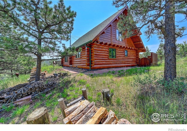 114 Jade Way, Lyons, CO 80540 - view of side of property with log siding