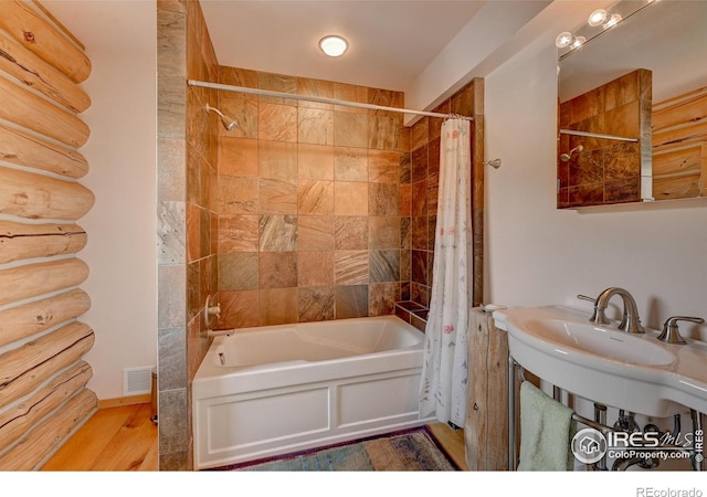 114 Jade Way, Lyons, CO 80540 - full bathroom featuring shower / tub combo with curtain and wood finished floors