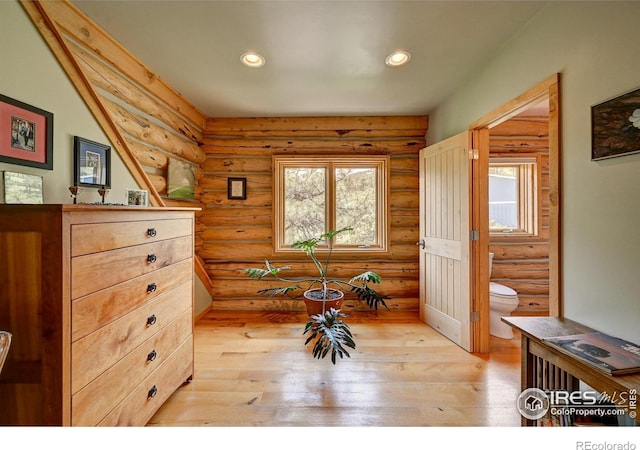 114 Jade Way, Lyons, CO 80540 - living area with rustic walls, healthy amount of natural light, recessed lighting, and light wood finished floors