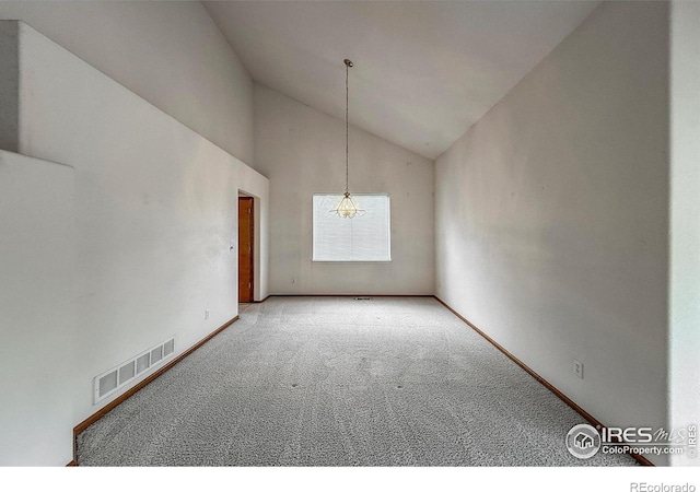 678 Mcclure Ct, Erie, CO 80516 - unfurnished room with carpet, baseboards, and high vaulted ceiling
